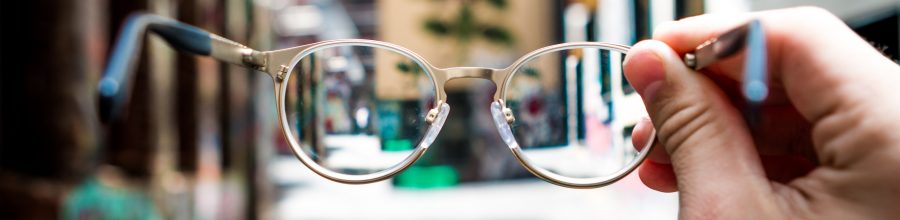 josh-calabrese-527813-unsplash looking through glasses seeing everything cloudy